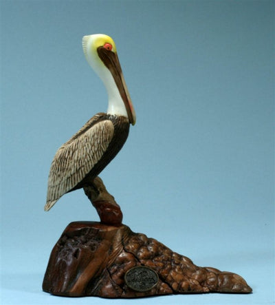 Pelican Sculpture on Burl Wood
